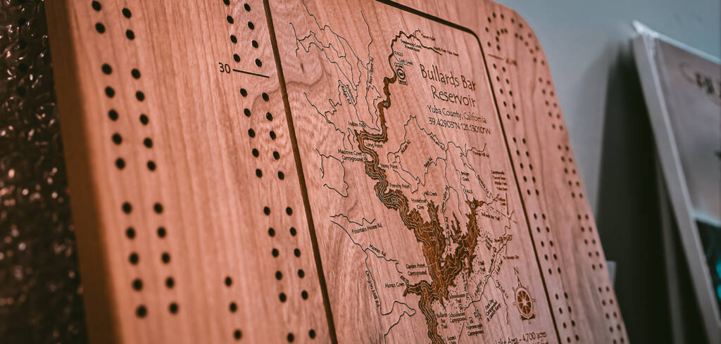 cribbage board with 3d bullards bar map made by lake art sold at emerald cove marina