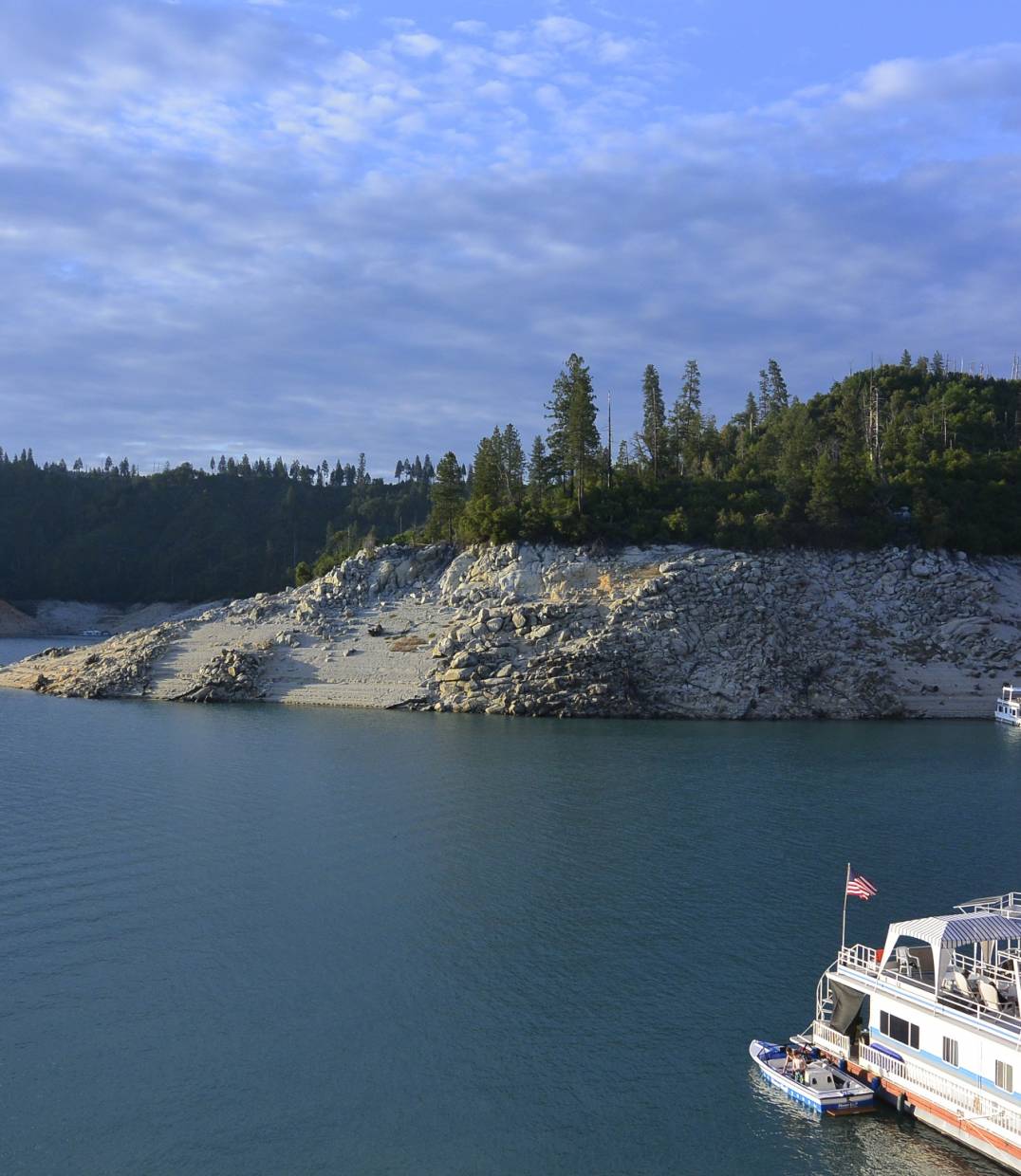 Gorgeous summer day exploring the quiet coves and glassy waters of Bullards Bar by boat.